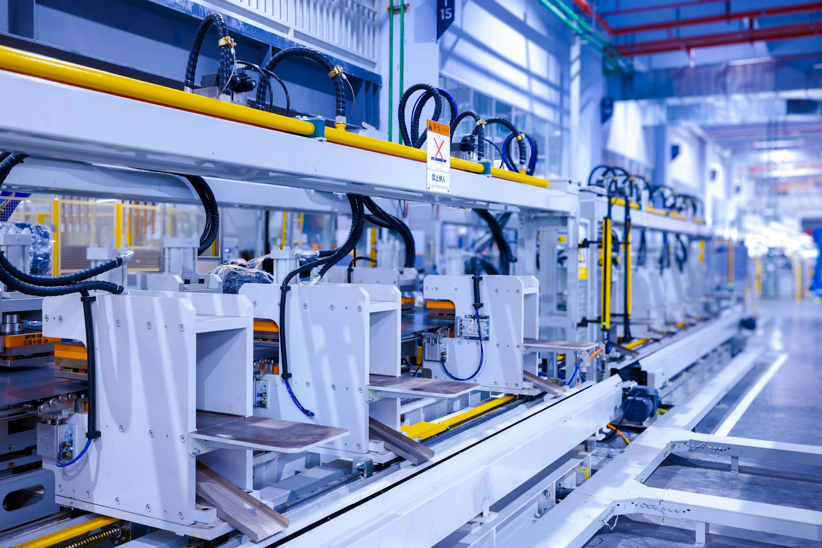 Electromechanical assembly line building ruggedized systems to customer drawings